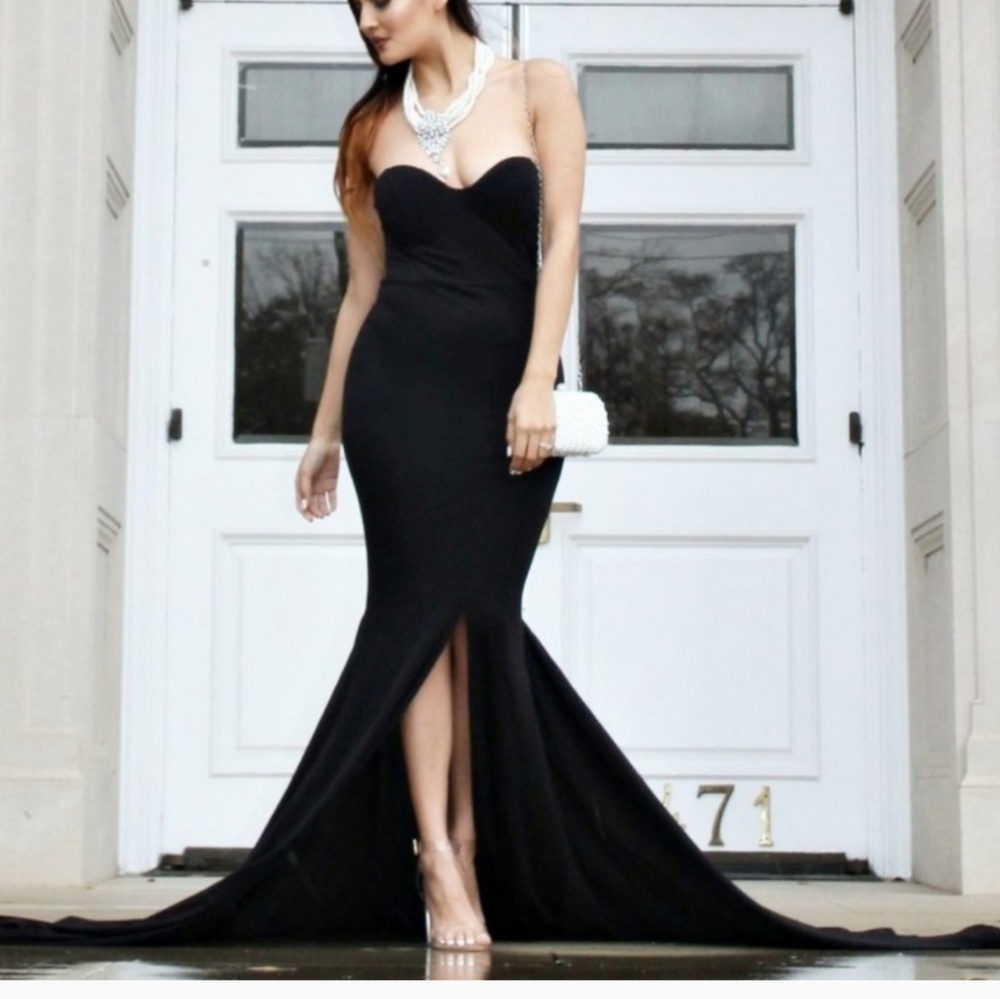 Black strapless ball gown with slit